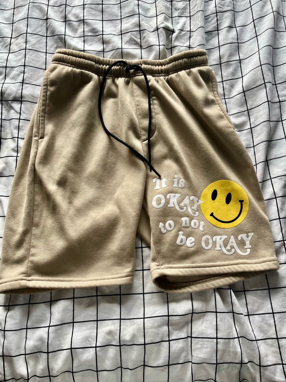 Triumph Beige Athletic Shorts with Yellow Smiley Graphic